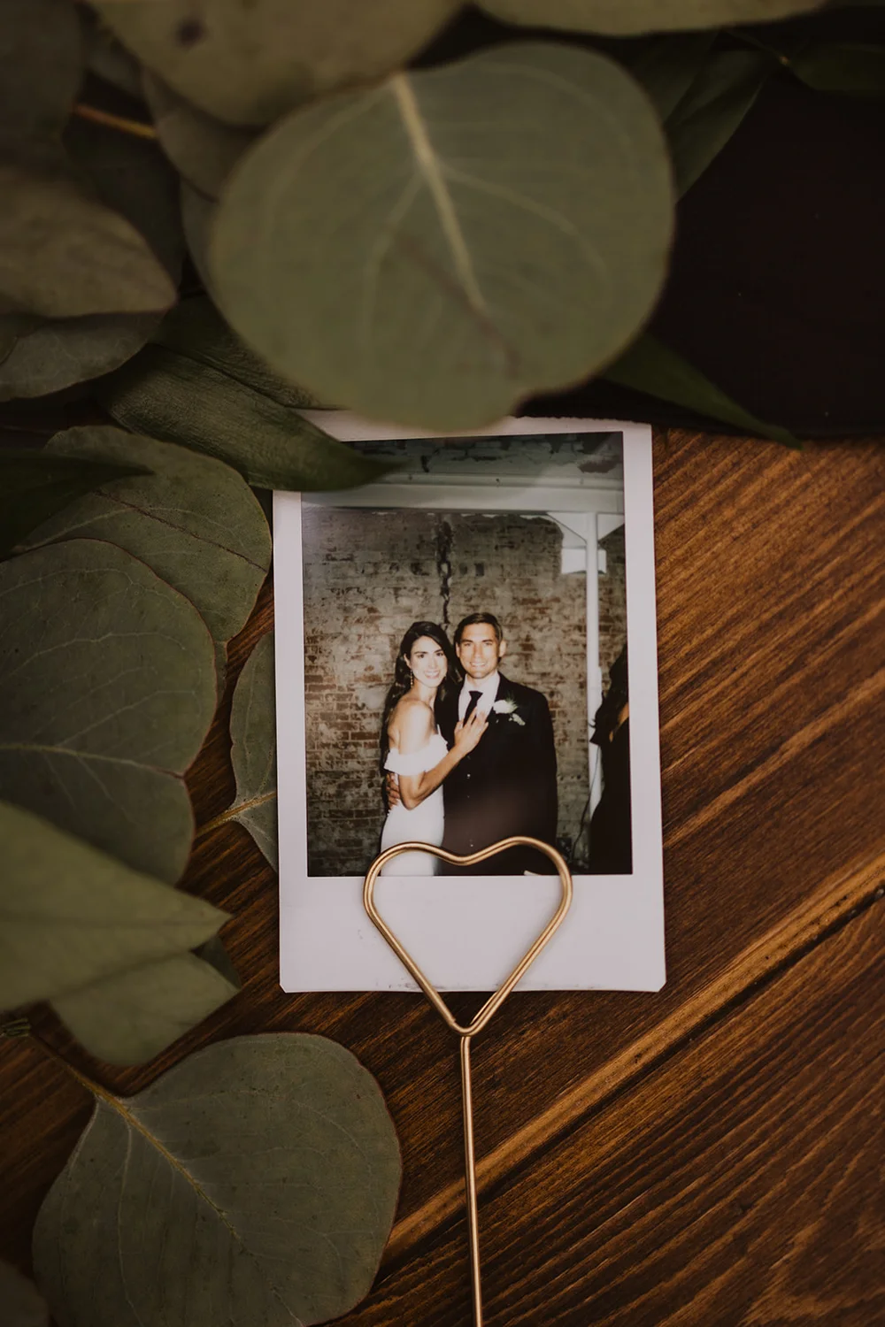 Polaroid photo of bride and groom