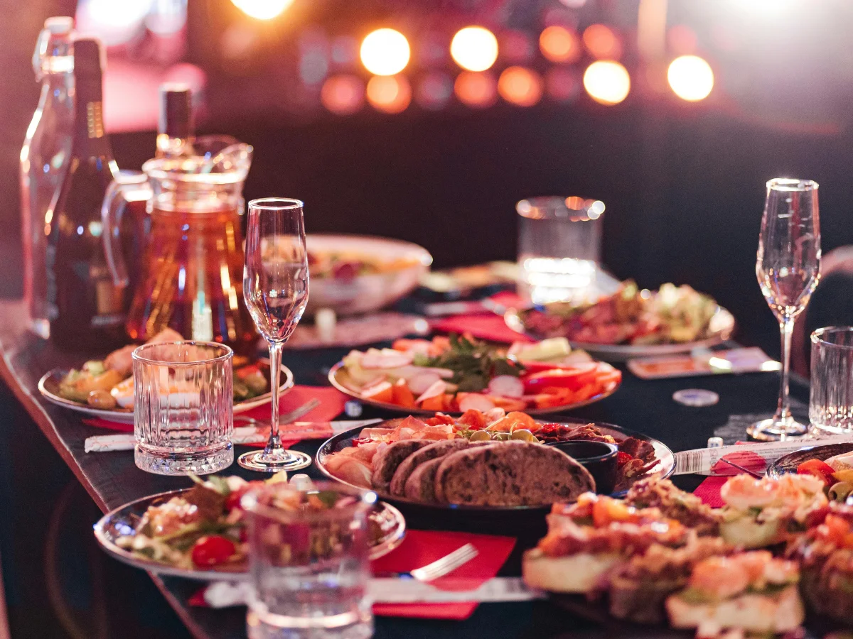 Intimate Galentine’s Day dinner with styled table décor, candles, and shared dishes