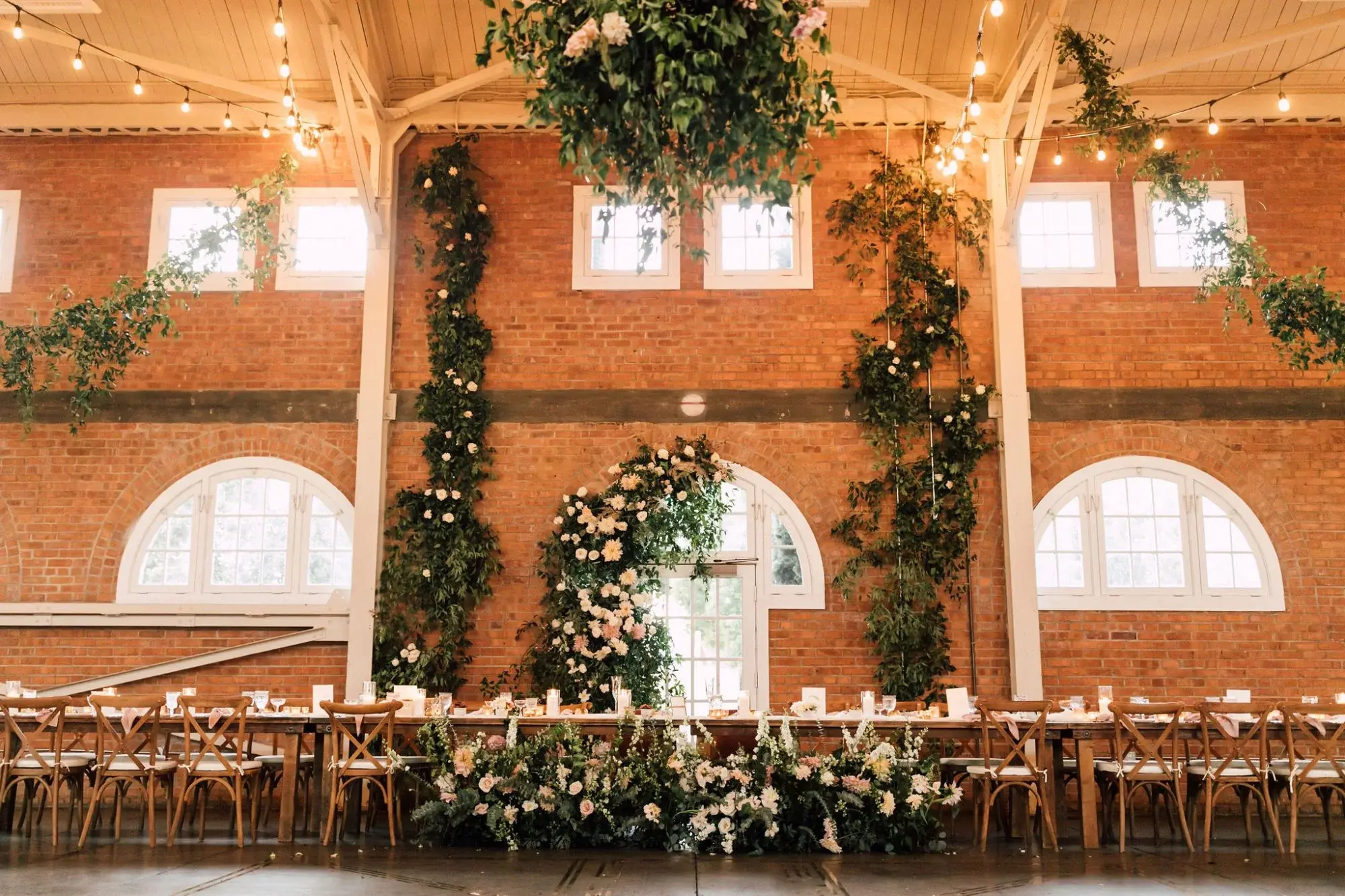 Wedding reception setup showcasing experience-driven venue marketing at an 828 Venues event space